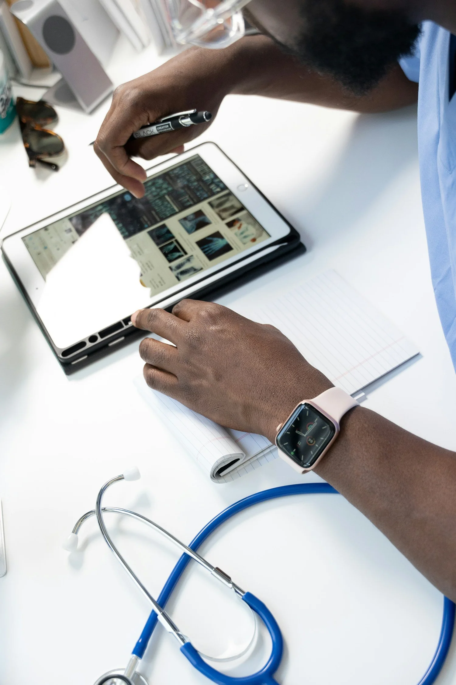 A clinician reviewing results on a tablet